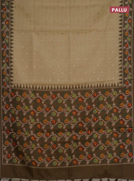 Art kota saree pale yellow and mehendi green with allover zari woven buttas and temple design ikat printed border