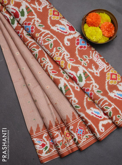 Art kota saree pastel orange and rustic orange with allover zari woven buttas and temple design ikat printed border