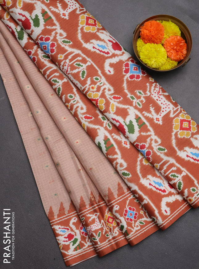 Art kota saree pastel orange and rustic orange with allover zari woven buttas and temple design ikat printed border