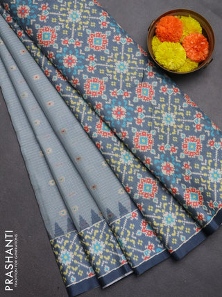 Art kota saree pastel grey and grey with allover zari woven buttas and temple design ikat printed border