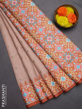 Art kota saree pastel orange and rustic orange with allover zari woven buttas and temple design ikat printed border