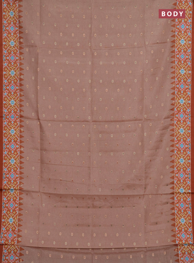 Art kota saree pastel orange and rustic orange with allover zari woven buttas and temple design ikat printed border