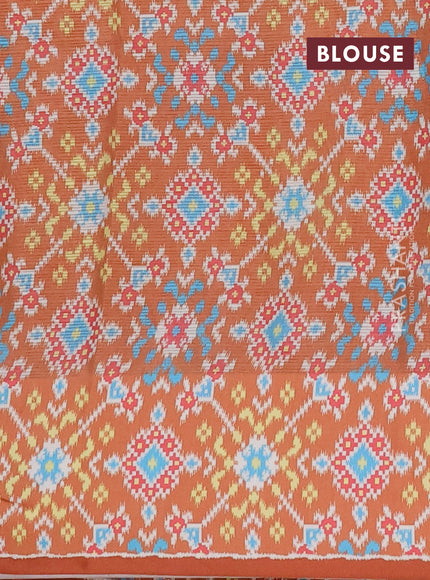 Art kota saree pastel orange and rustic orange with allover zari woven buttas and temple design ikat printed border