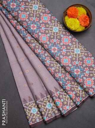 Art kota saree pastel pink shade and coffee brown with allover zari woven buttas and temple design ikat printed border