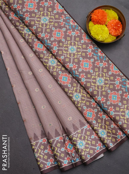 Art kota saree pastel pink shade and coffee brown with allover zari woven buttas and temple design ikat printed border