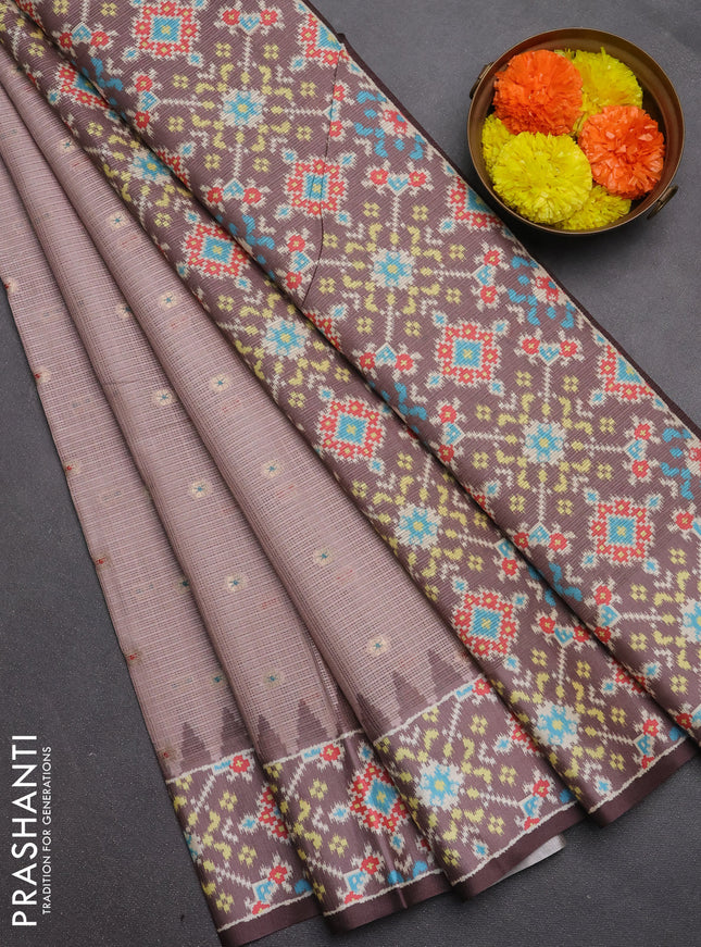 Art kota saree pastel pink shade and coffee brown with allover zari woven buttas and temple design ikat printed border