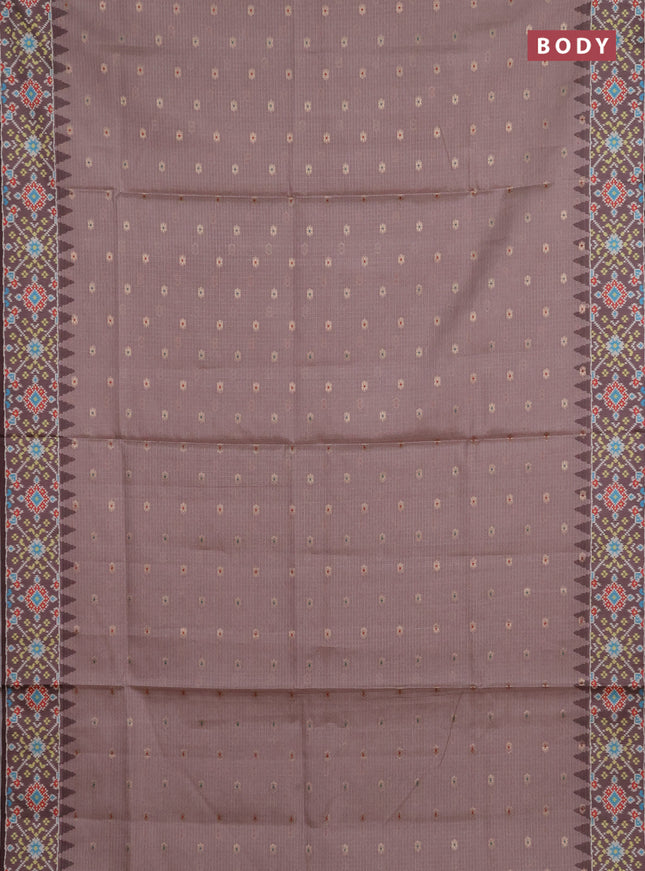 Art kota saree pastel pink shade and coffee brown with allover zari woven buttas and temple design ikat printed border