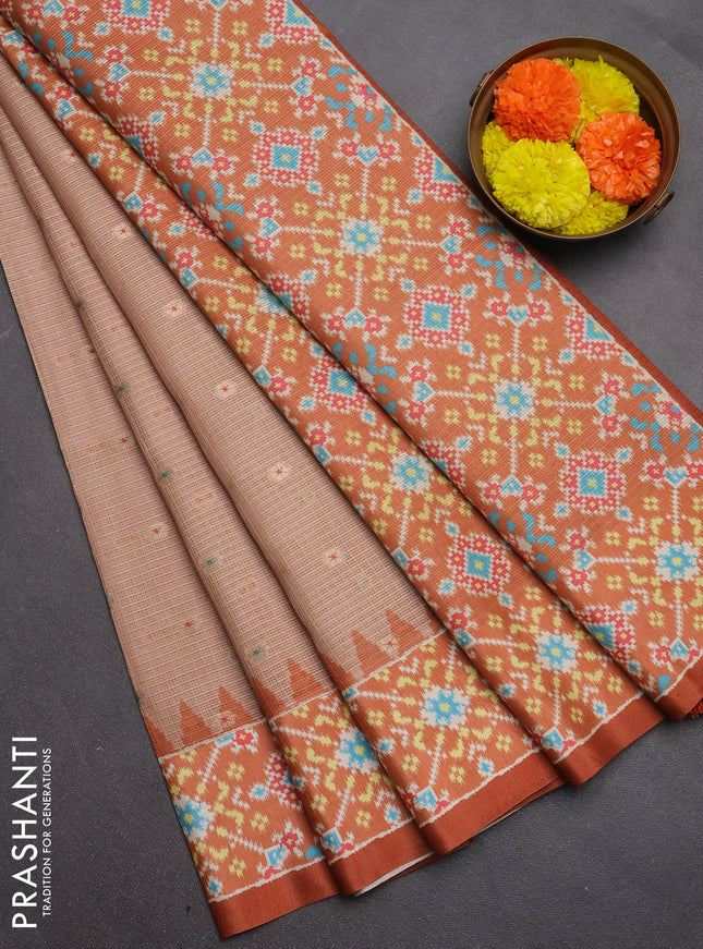 Art kota saree pastel orange and rustic orange with allover zari woven buttas and temple design ikat printed border