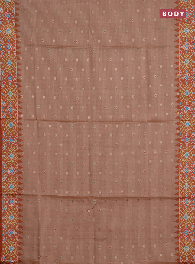 Art kota saree pastel orange and rustic orange with allover zari woven buttas and temple design ikat printed border