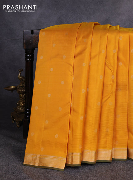 Pure kanchipuram silk saree yellow and green with zari woven buttas and small zari woven border