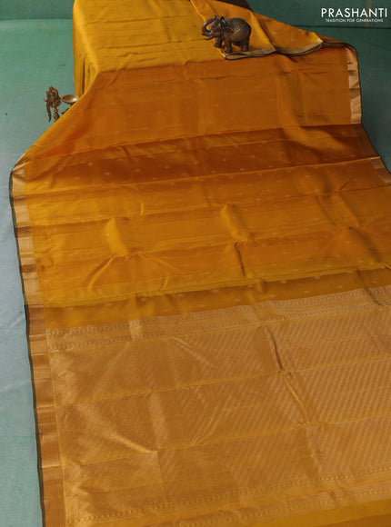 Pure kanchipuram silk saree yellow and green with zari woven buttas and small zari woven border