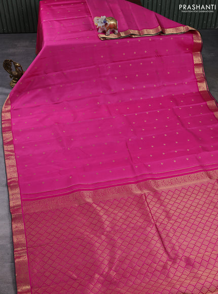 Pure kanchipuram silk saree light pink and pink with allover zari woven buttas and small zari woven border