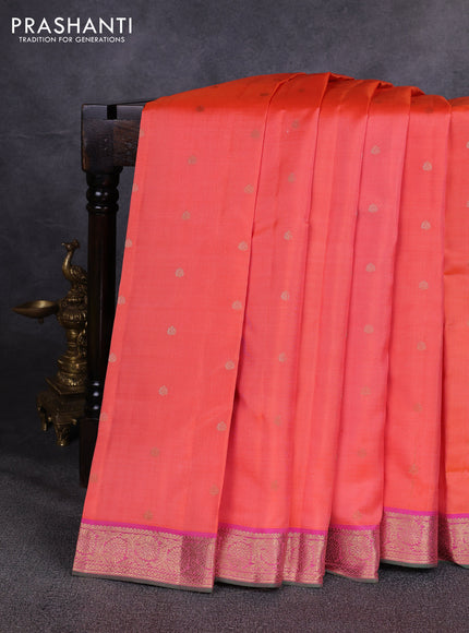 Pure kanchipuram silk saree peach orange and pink with allover zari woven buttas and small zari woven border