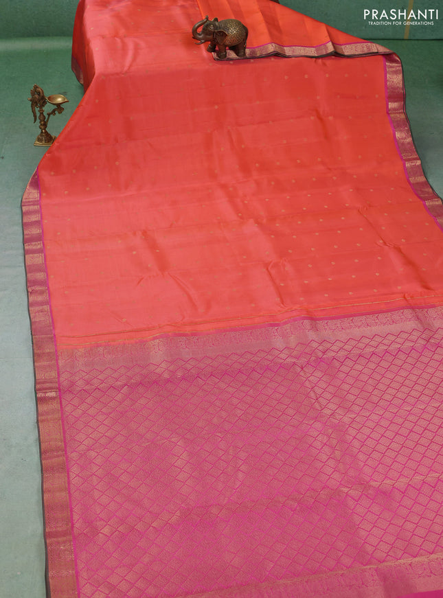 Pure kanchipuram silk saree peach orange and pink with allover zari woven buttas and small zari woven border