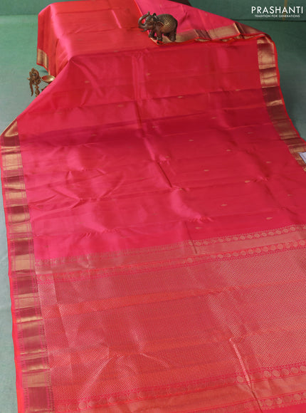 Pure kanchipuram silk saree peach orange with zari woven buttas and zari woven border