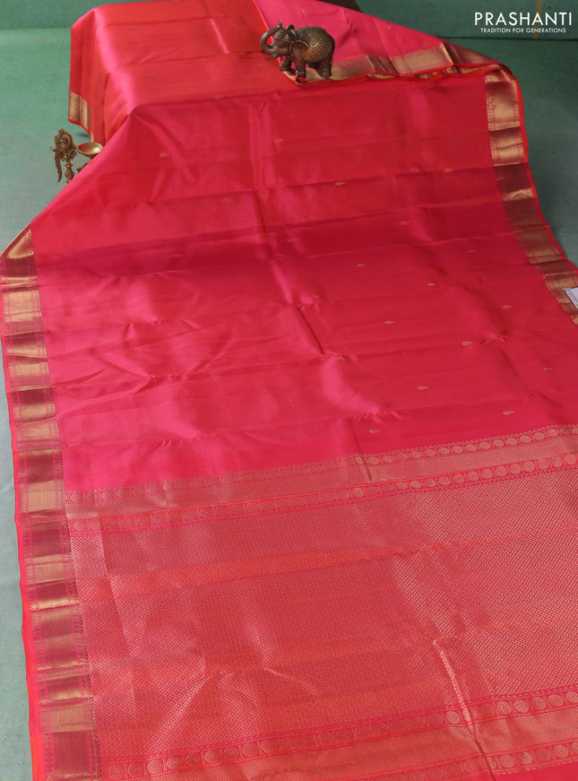Pure kanchipuram silk saree peach orange with zari woven buttas and zari woven border
