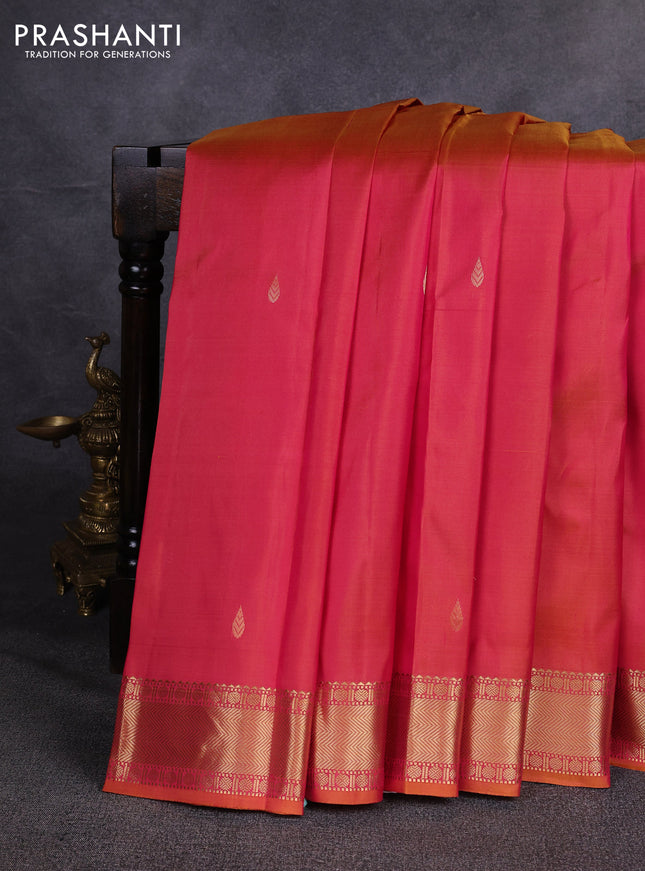 Pure kanchipuram silk saree dual shade of pinkish orange with zari woven buttas and zari woven border