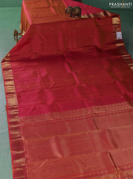 Pure kanchipuram silk saree dual shade of pinkish orange with zari woven buttas and zari woven border
