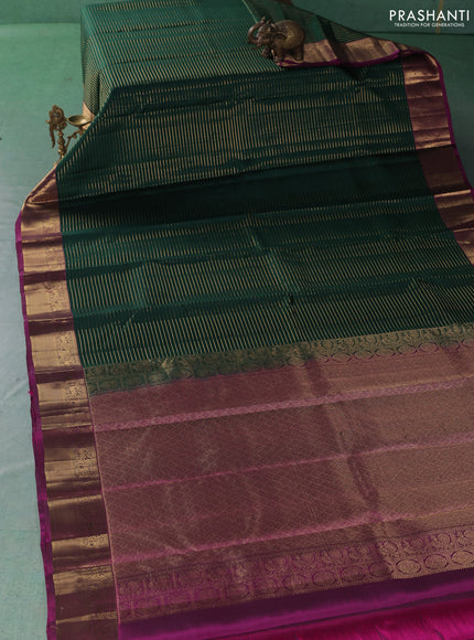 Pure kanchipuram silk saree green and magenta pink with allover zari weaves and zari woven border