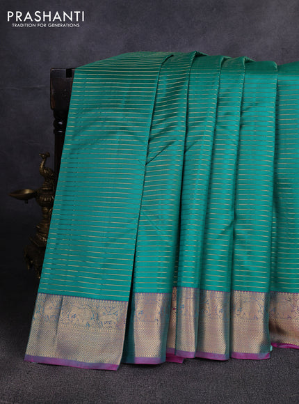 Pure kanchipuram silk saree teal green and pink with allover zari weaves and zari woven border