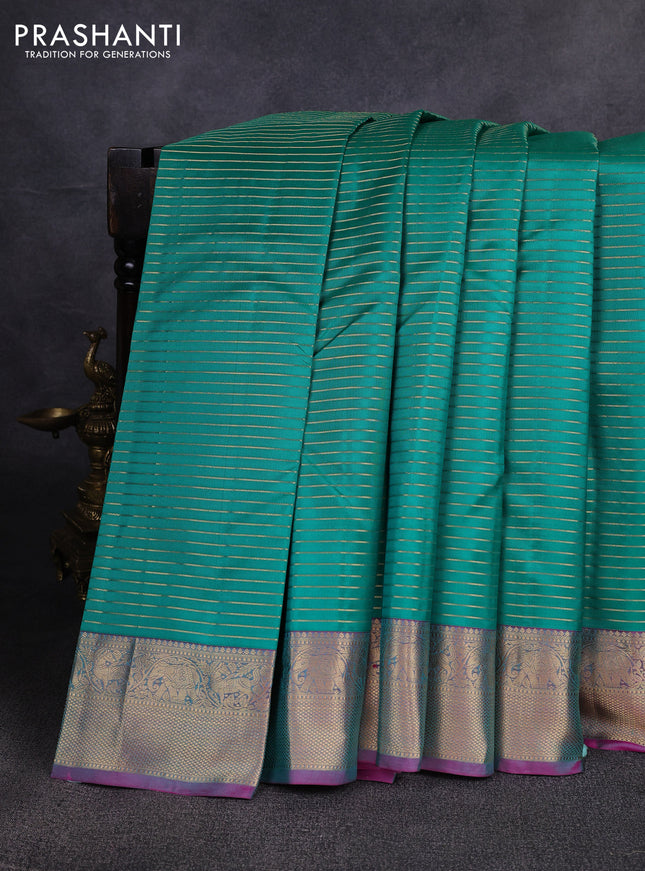 Pure kanchipuram silk saree teal green and pink with allover zari weaves and zari woven border