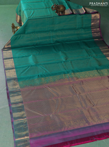 Pure kanchipuram silk saree teal green and pink with allover zari weaves and zari woven border