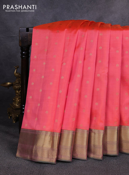 Pure kanchipuram silk saree peach orange with allover zari woven buttas and zari woven border