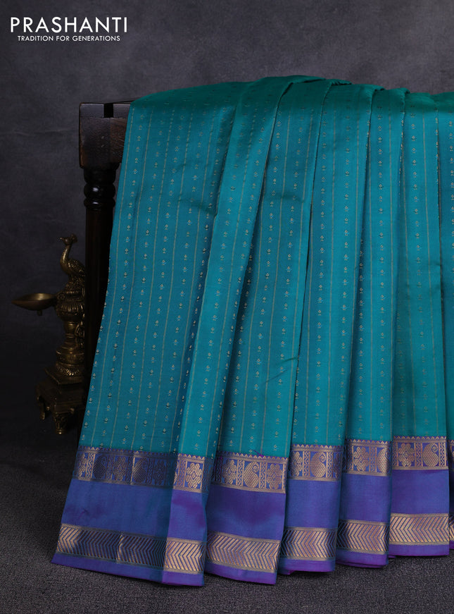 Pure kanchipuram silk saree teal green and purple with allover zari weaves & buttas and rettapet zari woven border