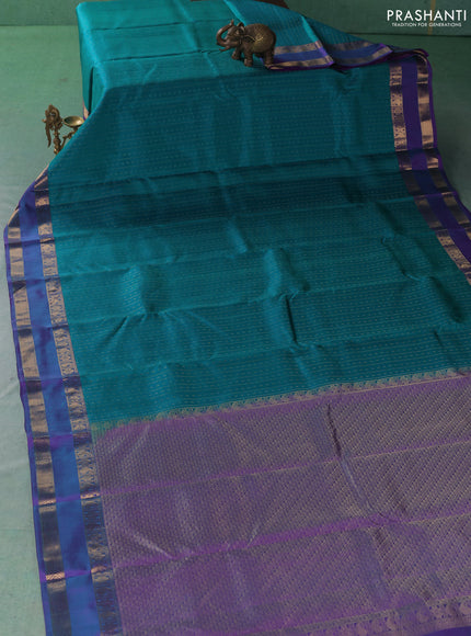 Pure kanchipuram silk saree teal green and purple with allover zari weaves & buttas and rettapet zari woven border