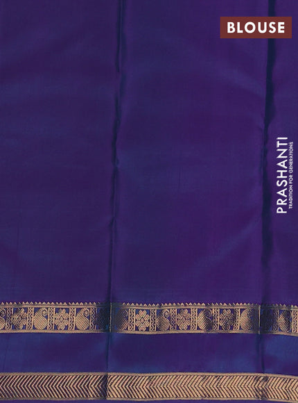 Pure kanchipuram silk saree teal green and purple with allover zari weaves & buttas and rettapet zari woven border