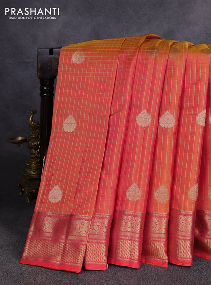 Pure kanchipuram silk saree dual shade of pinkish orange with allover zari checks & buttas and zari woven border