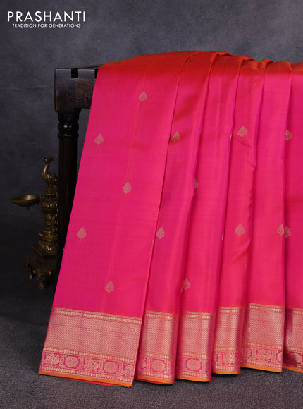 Pure kanchipuram silk saree dual shade of pinkish orange with allover zari woven buttas and zari woven border