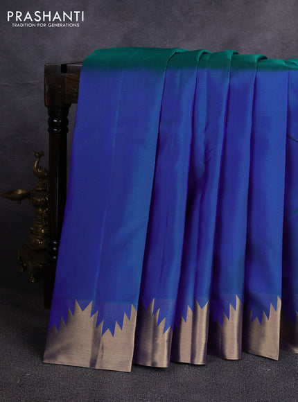 Pure kanchipuram silk saree dual shade of bluish green with plain body and temple design zari woven border