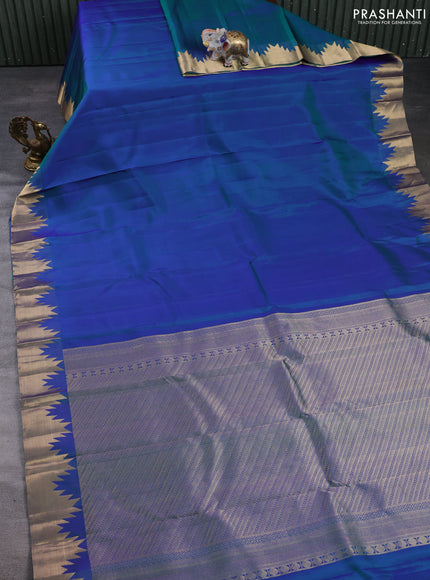 Pure kanchipuram silk saree dual shade of bluish green with plain body and temple design zari woven border