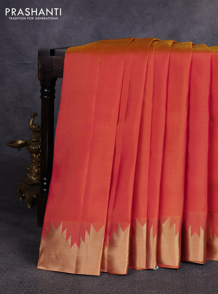 Pure kanchipuram silk saree dual shade of pinkish yellow with plain body and temple design zari woven border