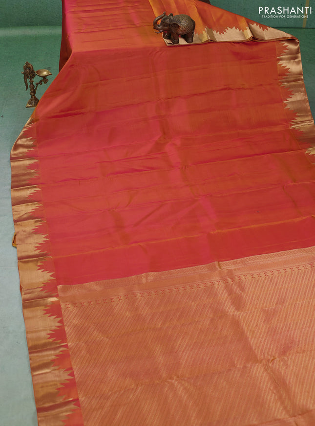 Pure kanchipuram silk saree dual shade of pinkish yellow with plain body and temple design zari woven border