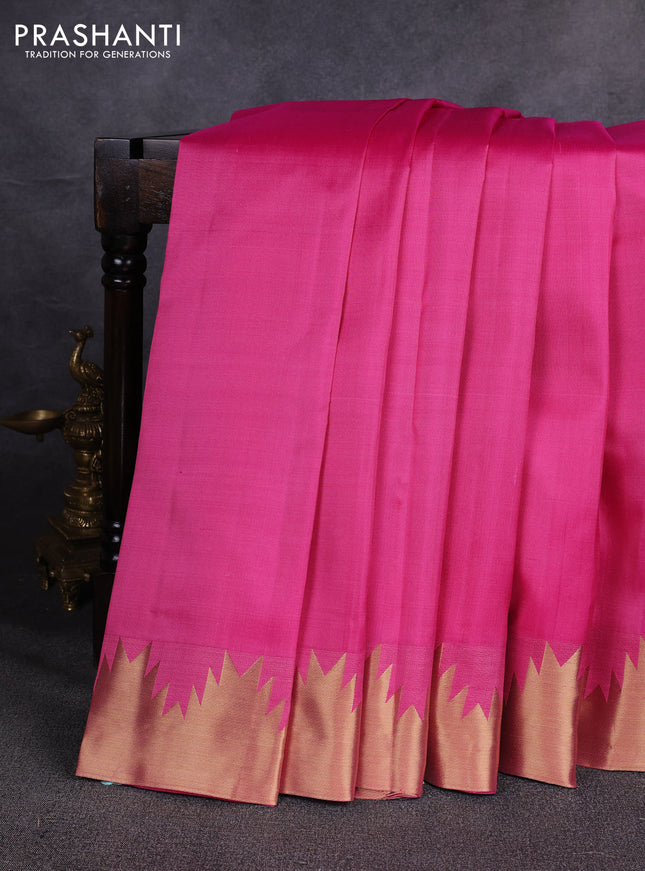 Pure kanchipuram silk saree pink with plain body and temple design zari woven border