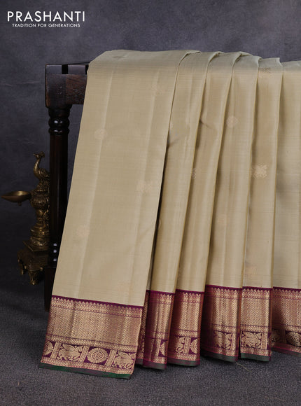 Pure kanchipuram silk saree pastel green and magenta pink with allover zari woven buttas and zari woven korvai border