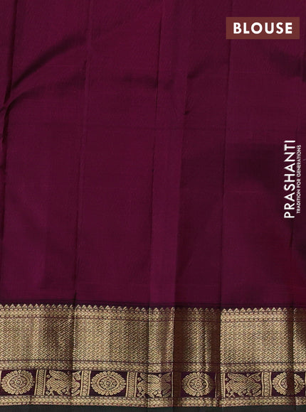 Pure kanchipuram silk saree pastel green and magenta pink with allover zari woven buttas and zari woven korvai border