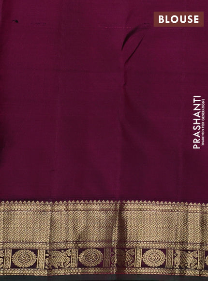 Pure kanchipuram silk saree green and magenta pink with allover zari woven buttas and zari woven korvai border