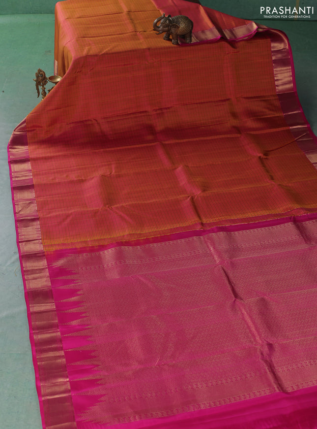 Pure kanchipuram silk saree dual shade of pinkish yellow and pink with allover checked pattern and zari woven border