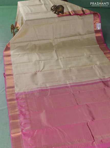 Pure kanchipuram silk saree cream and pink with allover checked pattern and zari woven border