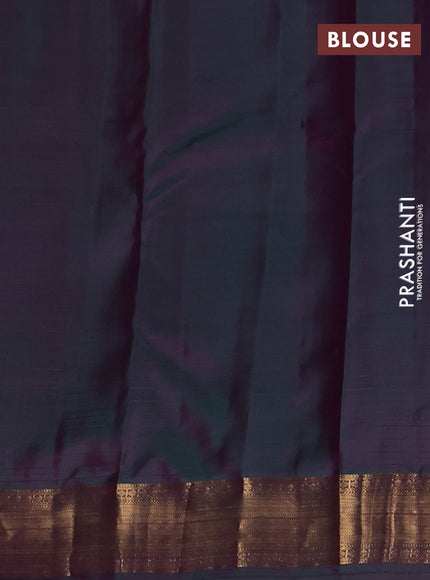 Pure kanchipuram silk saree orange and green with allover checked pattern and zari woven border