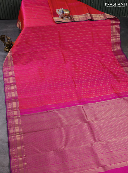 Pure kanchipuram silk saree dual shade of pink and magenta pink with allover zari woven buttas and zari woven border