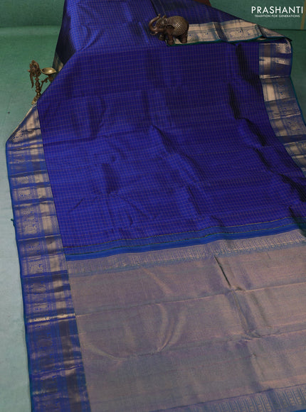 Pure kanchipuram silk saree blue and dual shade of green with allover small checks & buttas and zari woven border