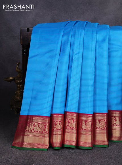 Pure kanchipuram silk saree cs blue and maroon with allover stripe pattern and zari woven korvai border
