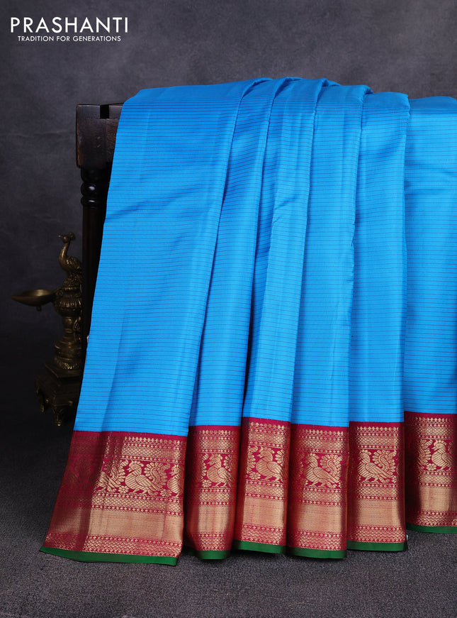 Pure kanchipuram silk saree cs blue and maroon with allover stripe pattern and zari woven korvai border