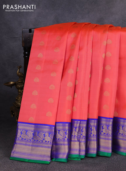 Pure kanchipuram silk saree peach orange and violet with allover zari woven buttas and zari woven korvai border