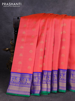 Pure kanchipuram silk saree peach orange and violet with allover zari woven buttas and zari woven korvai border