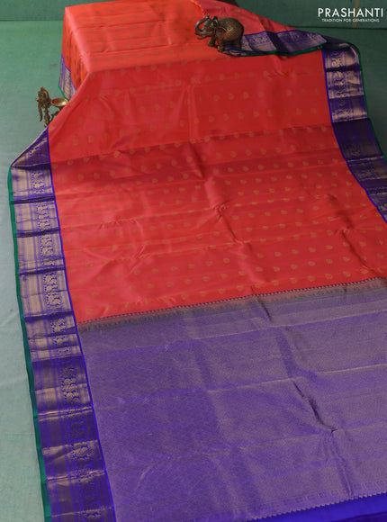 Pure kanchipuram silk saree peach orange and violet with allover zari woven buttas and zari woven korvai border